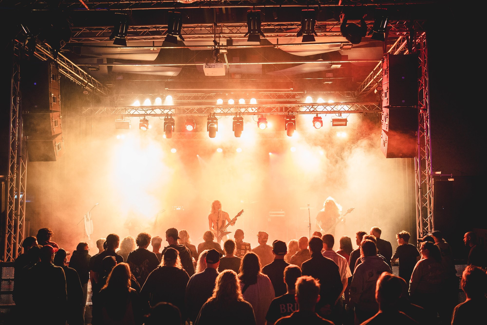 Crowd and stage lights at Alive Festival Saturday